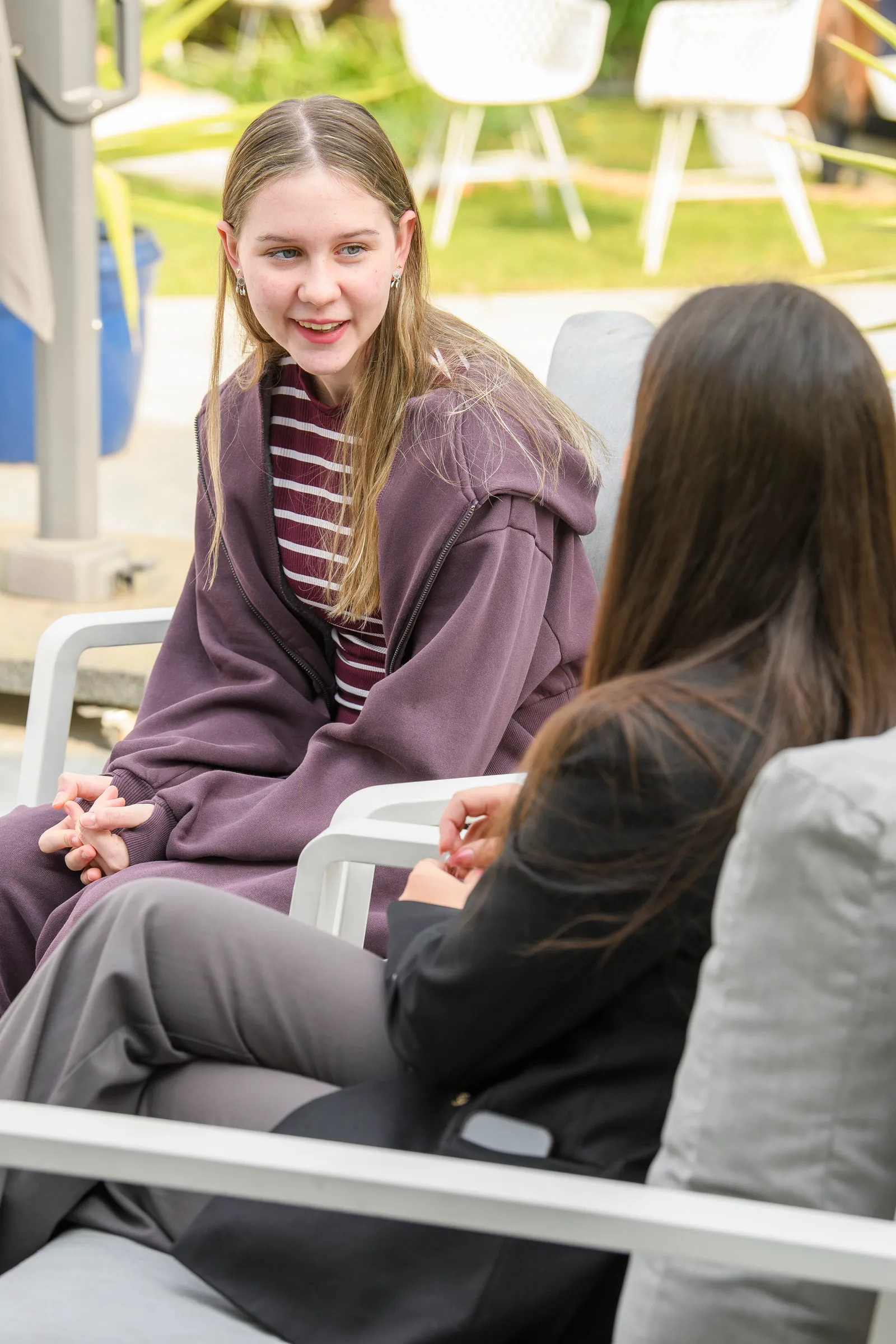 A student smiling during an individual consultation