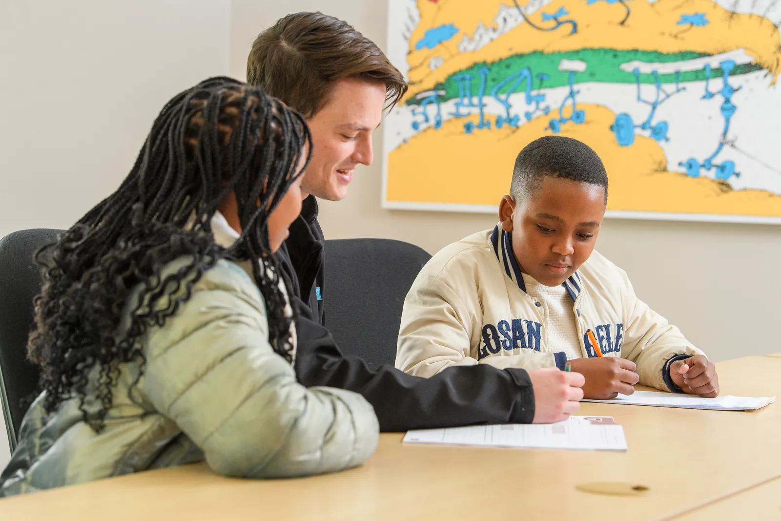 A Genius tutor supporting students as they work through written exercises